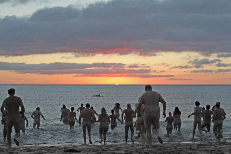 Naturists attend an annual skinny dip