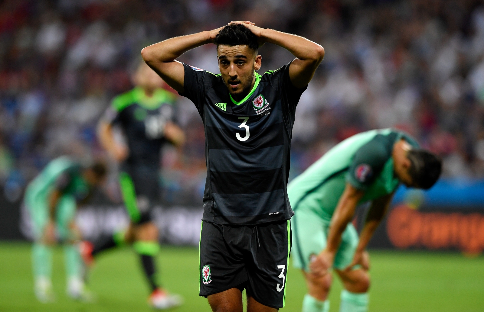 Neil Taylor looks down Neil Taylor looks down