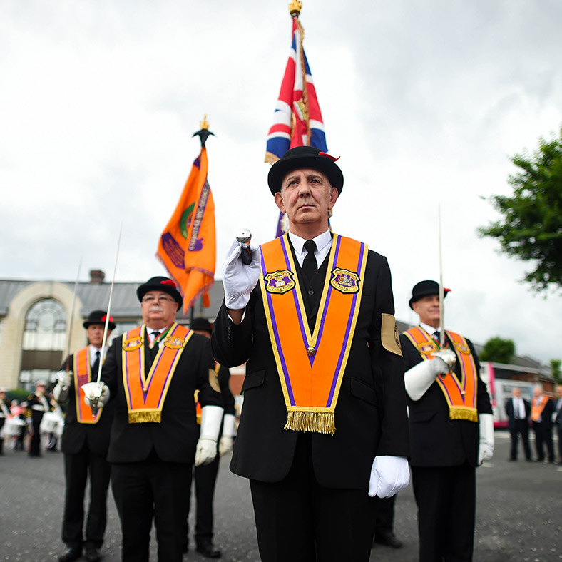 Photos of Orange Order march in Belfast and bonfires around Northern
