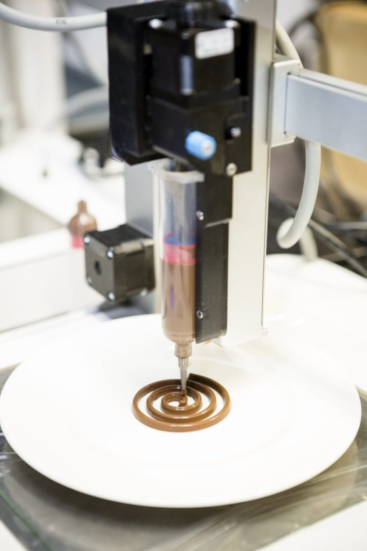 A chocolate spiral being 3-D printed