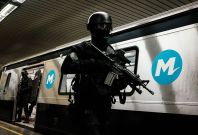 Brazilian police officers train for security measures and emergency situations in coordination with the French national police (REID) before the Rio 2016 Olympic and Paralympic Games, in a subway station in Rio de Janeiro,