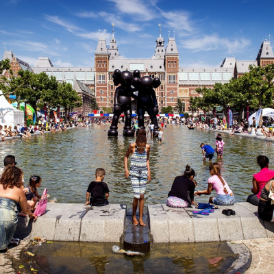 People in Amsterdam cool off in fountain