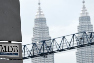 1MDB: Singapore’s central bank to take “firm regulatory actions” against Standard Chartered, UBS and DBS Bank
