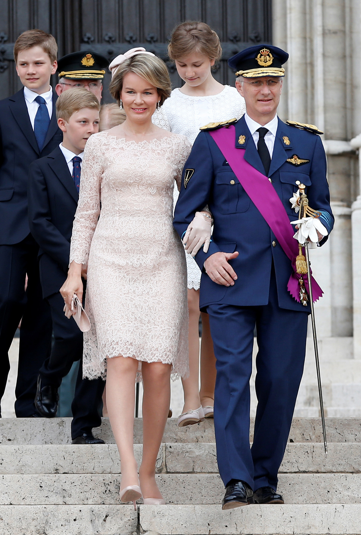 Queen Mathilde stuns in peach lace dress with family for Belgian ...