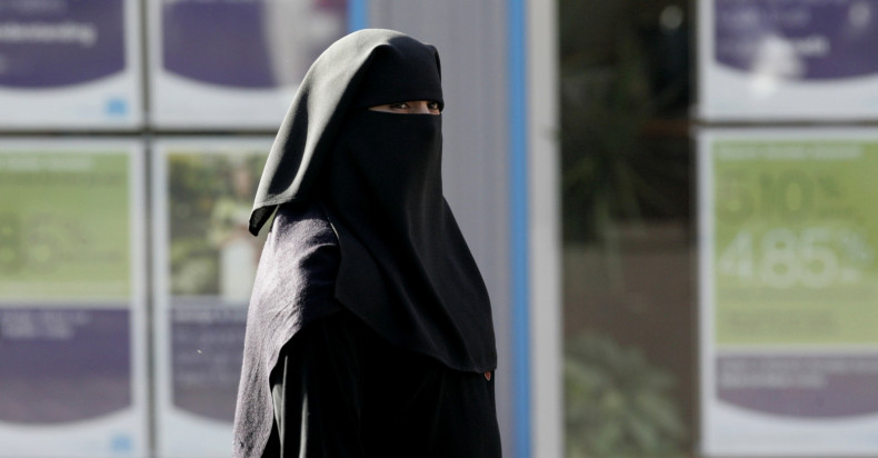 A Muslim woman wearing a niqab in