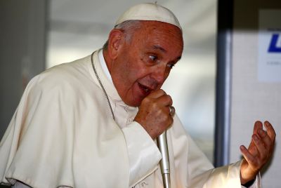 Pope Francis on a plane