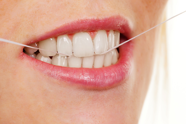 Flossing teeth 'ineffective against gum disease'Flossing teeth 'ineffective against gum disease'
