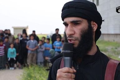 isis jihadi talks to crowd
