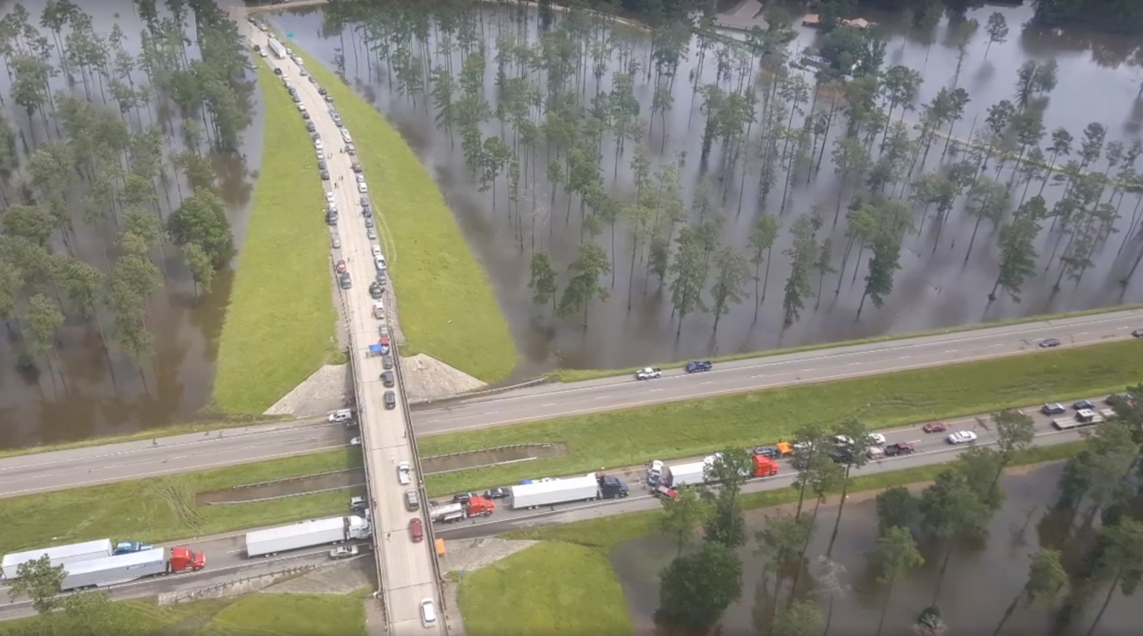 At least 6 dead and 20,000 others rescued in record-breaking Louisiana ...