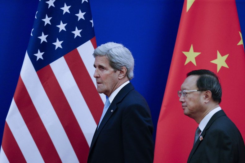 John Kerry and  Yang Jiechi