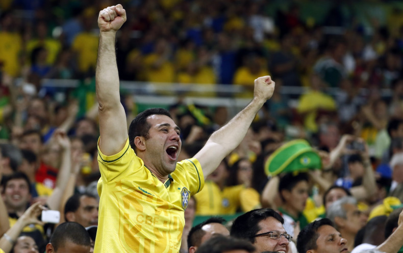 A Brazil supporter urges his team on