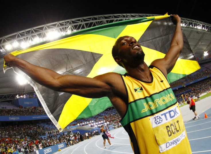 Usain Bolt of Jamaica celebrates winning the men's 200 metres final at the IAAF World Athletics Championships in Daegu