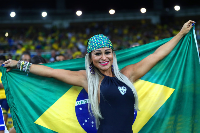 A Brazil fan watches the game