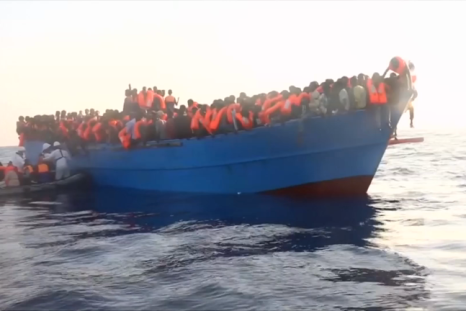 Refugee crisis: Hundreds of migrants rescued from cramped wooden boat of the coast of Libya