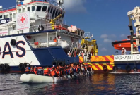 Rescue Crews Help 123 People on Crowded Inflatable Boat in Mediterranean Rescue Crews Help 123 People on Crowded Inflatable Boat in Mediterranean