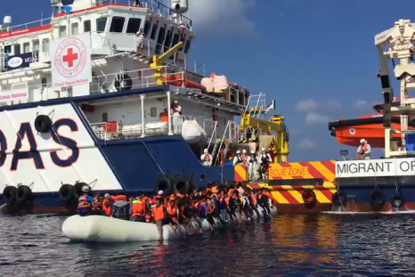 Rescue Crews Help 123 People on Crowded Inflatable Boat in Mediterranean