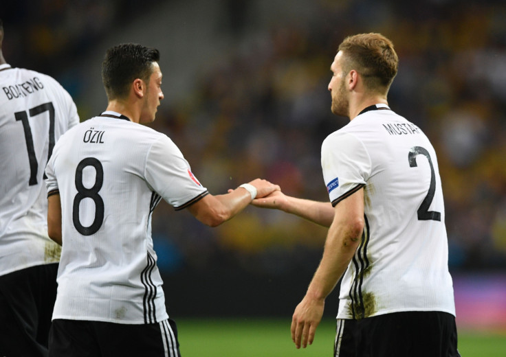 Mesut Ozil and Shkodran Mustafi