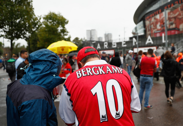 An Arsenal fan outside the ground