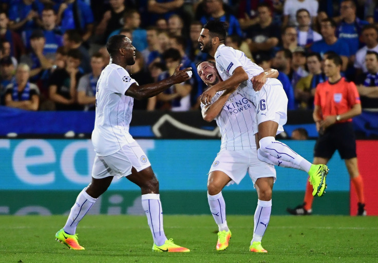 Leicester City players celebrate scoring