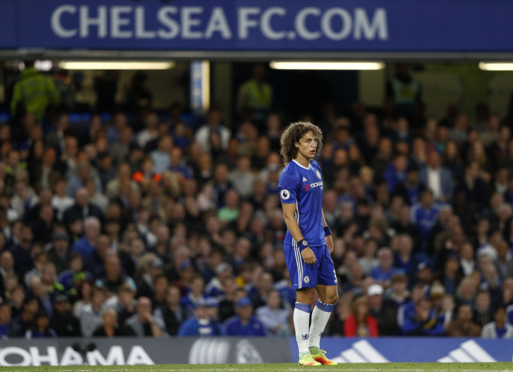 David Luiz watches on