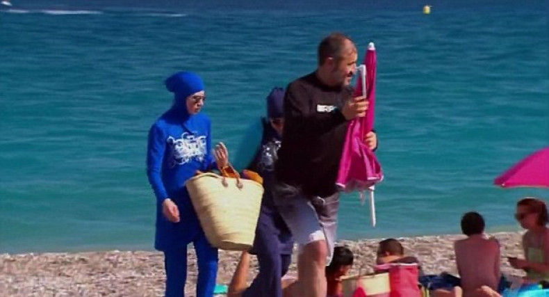 Woman wears burkini on beach in protest