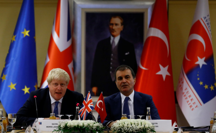 Boris Johnson and Omer Celik 