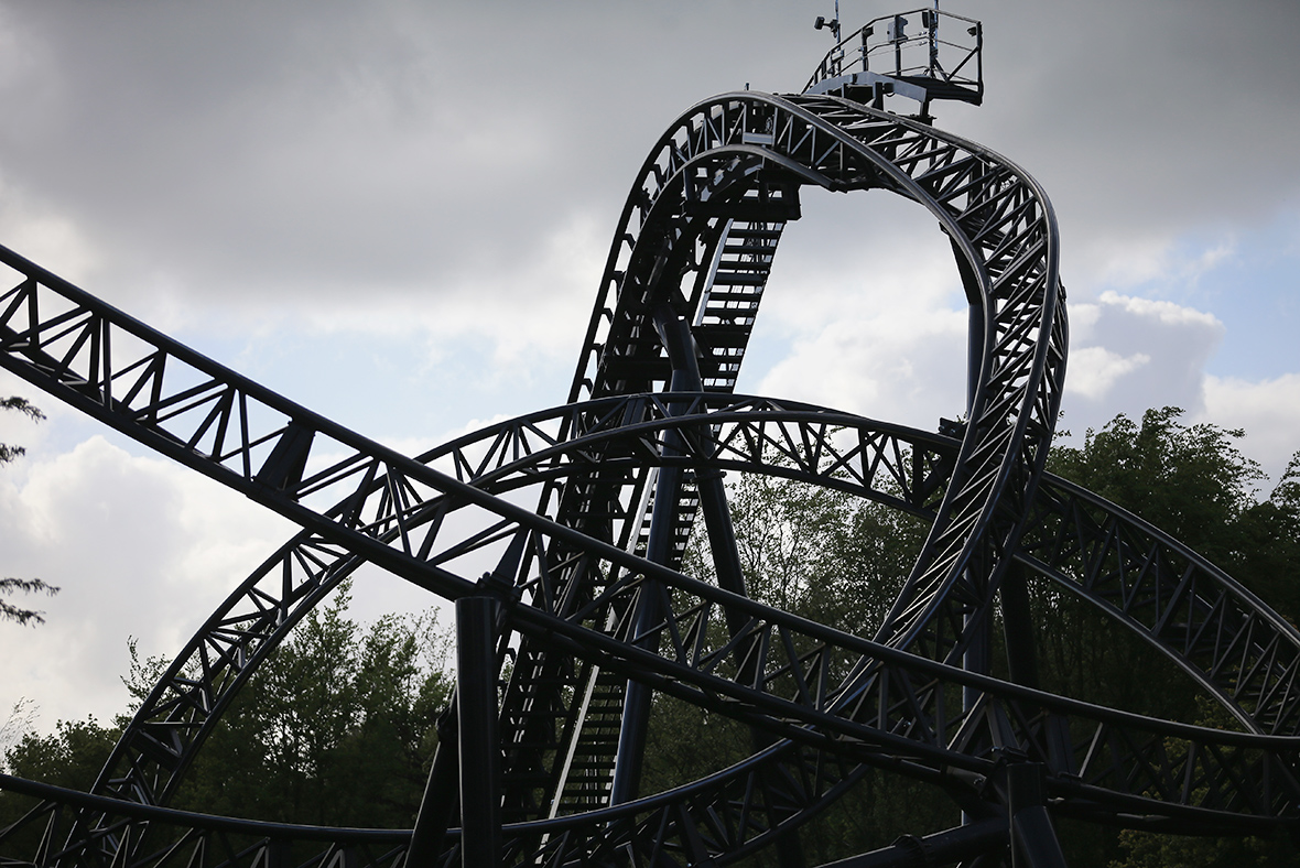 Terrified roller coaster riders get stuck 150 feet in the air for two ...