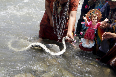 Peruvian shamans perform a ritual in the