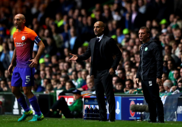 Pep Guardiola encourages his side Pep Guardiola encourages his side