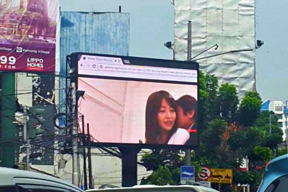 Indonesia man arrested for streaming porn on billboard | IBTimes UK