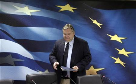 Greece's Finance Minister Evangelos Venizelos arrives for a news conference in Athens