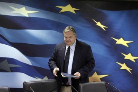 Greece's Finance Minister Evangelos Venizelos arrives for a news conference in Athens