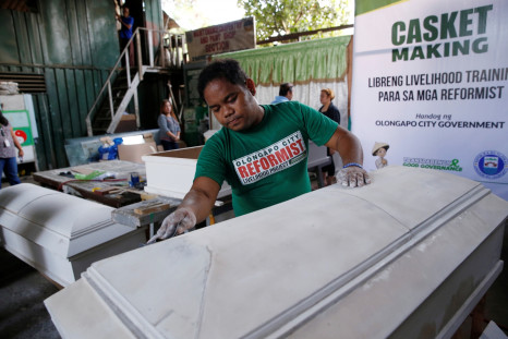 A former drug user undergoing rehabilitation makes coffins