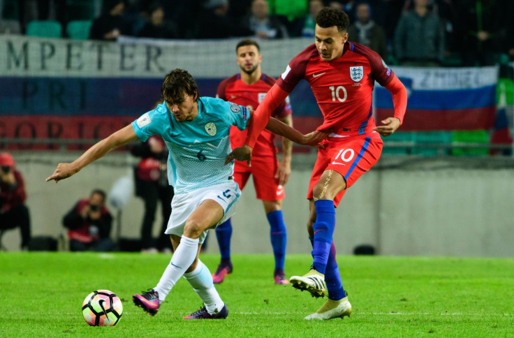 Dele Alli passes the ball