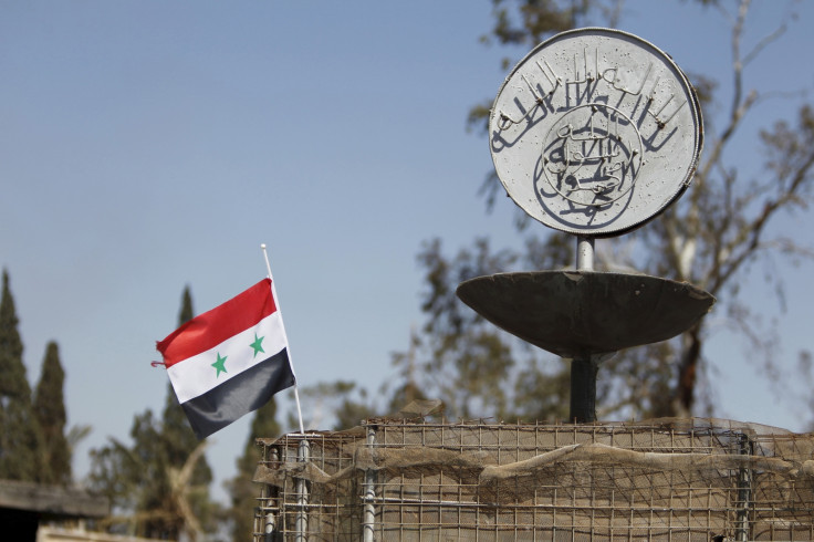 Syria flag near Isis slogan