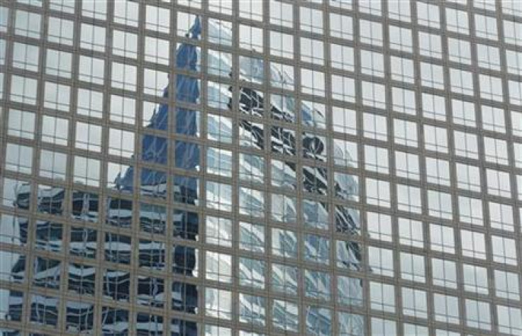 The Goldman Sachs headquarters building is reflected in the windows of a neighbouring building in New York