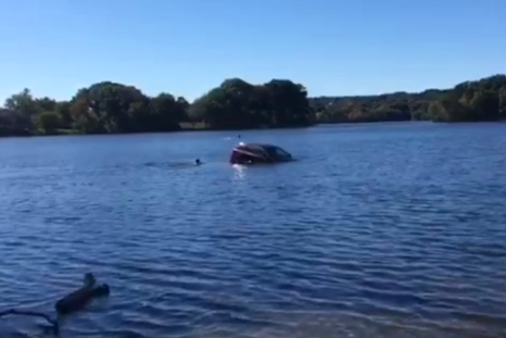 Good Samaritans rescue drowning woman from her sinking SUV