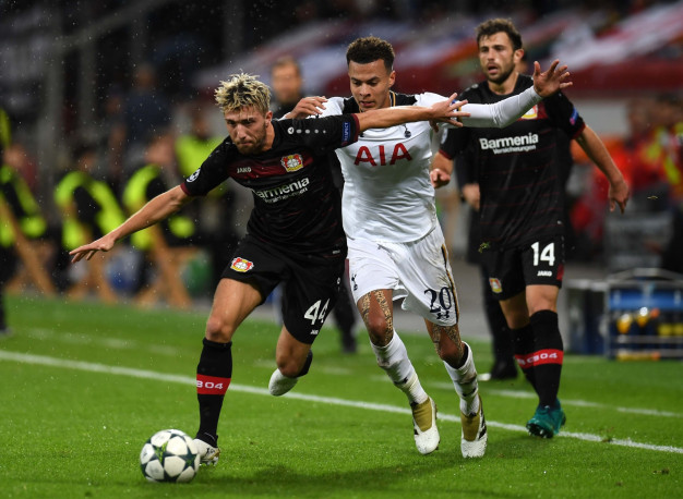 Dele Alli tries to win the ball Dele Alli tries to win the ball