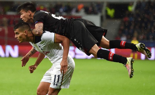 Erik Lamela is beaten to the ball Erik Lamela is beaten to the ball