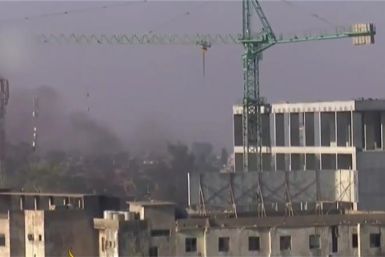 smoke rises over Kirkuk