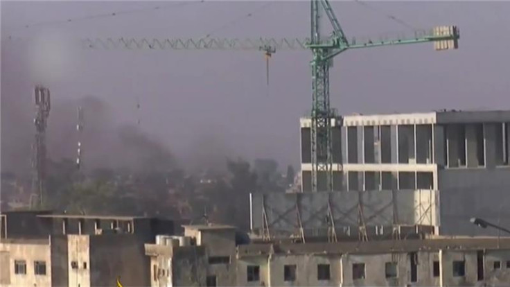 smoke rises over Kirkuk