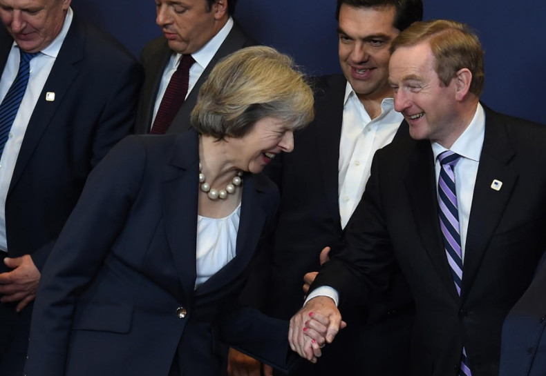  Theresa May (L) laughs with Ireland's Prime minister Enda Kenny