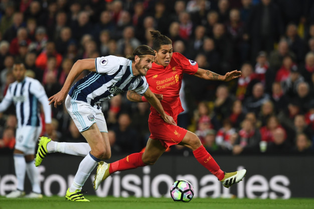 Jonas Olsson and Roberto Firmino Jonas Olsson and Roberto Firmino