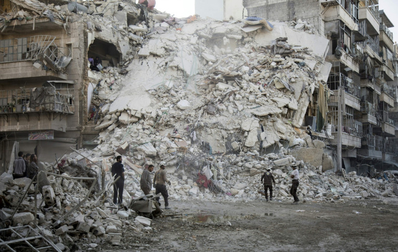 the White Helmets search for victims amid the rubble of a destroyed building