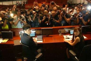 Hong Kong pro-independence lawmakers storm council chamber