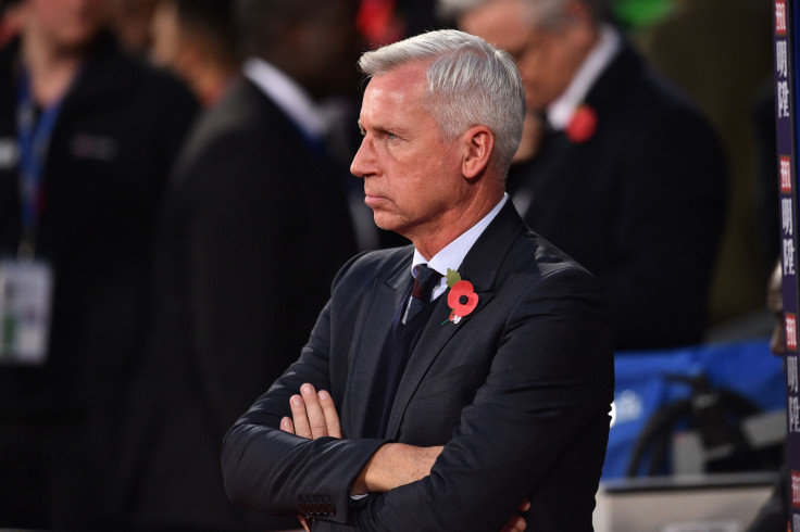 Alan Pardew watches on