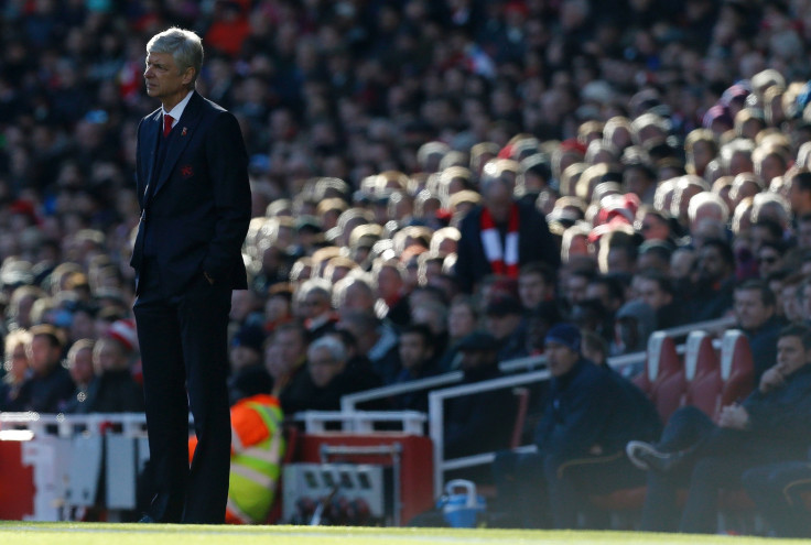 Arsene Wenger looks on