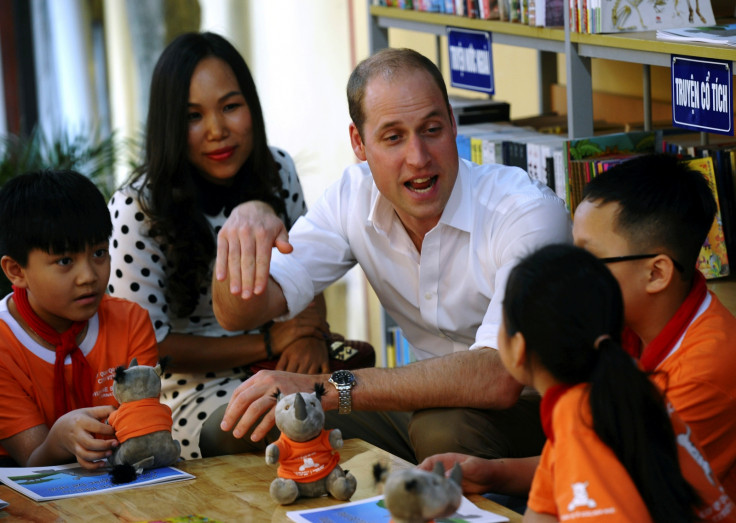 William talks to kids in Hanoi