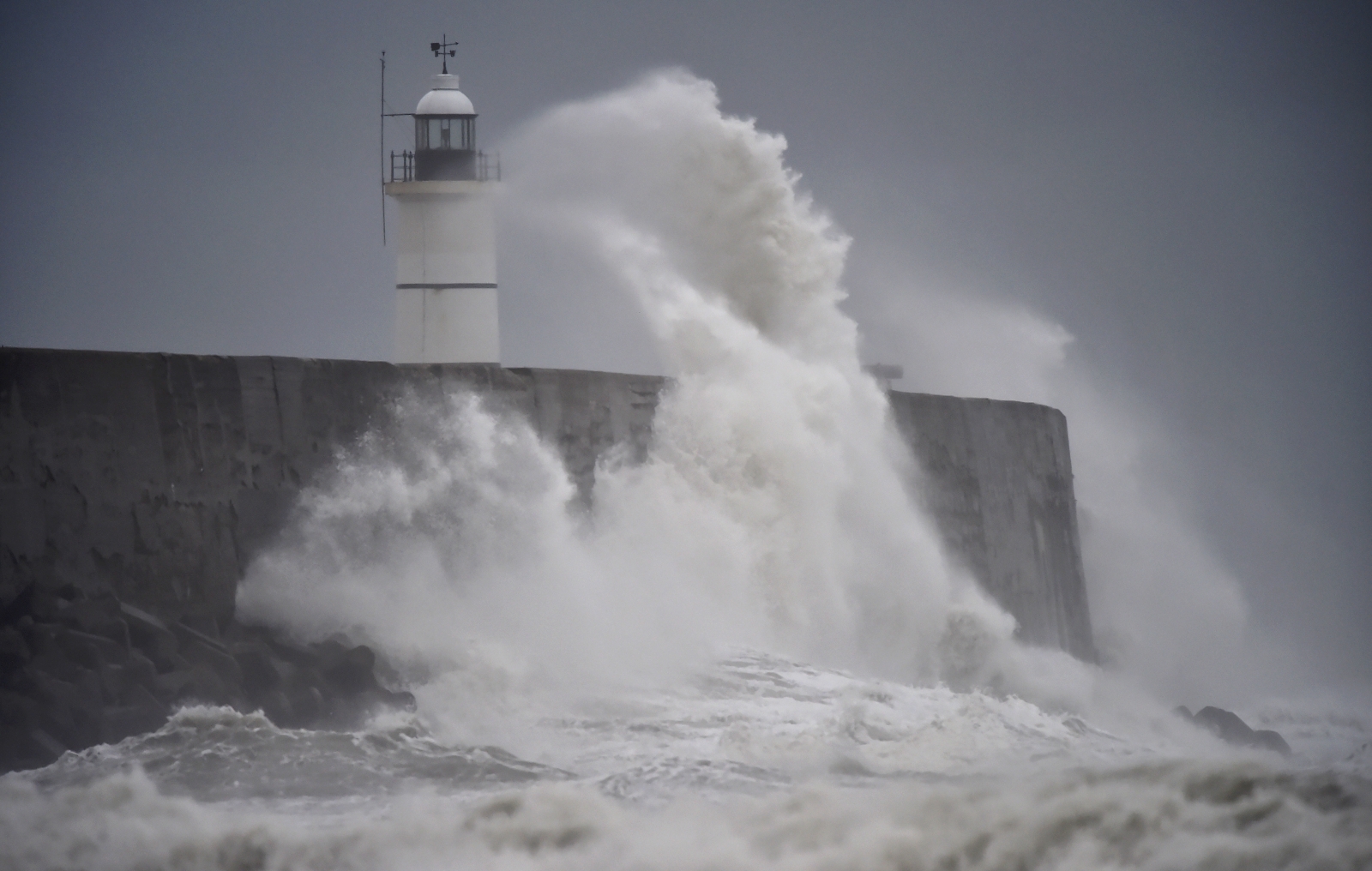 Storm Angus causes flash flooding and travel chaos in Britain