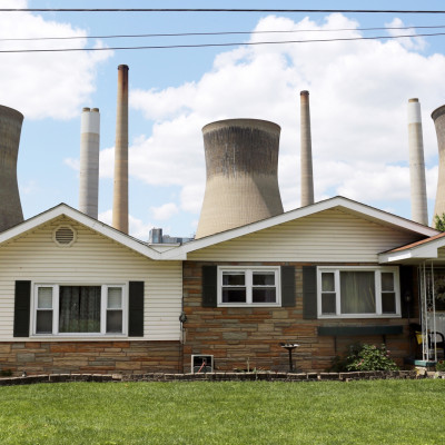 Coal plant seen behind West Virginia home